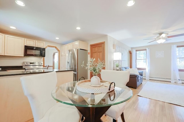 dining room with recessed lighting, light wood-style flooring, and ceiling fan