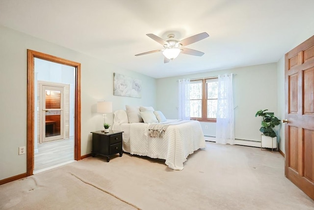 bedroom with a baseboard heating unit, baseboards, light colored carpet, and a ceiling fan