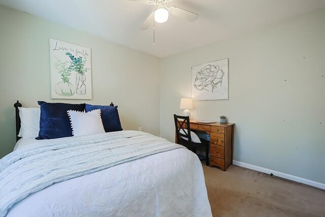 bedroom with baseboards, ceiling fan, and carpet flooring