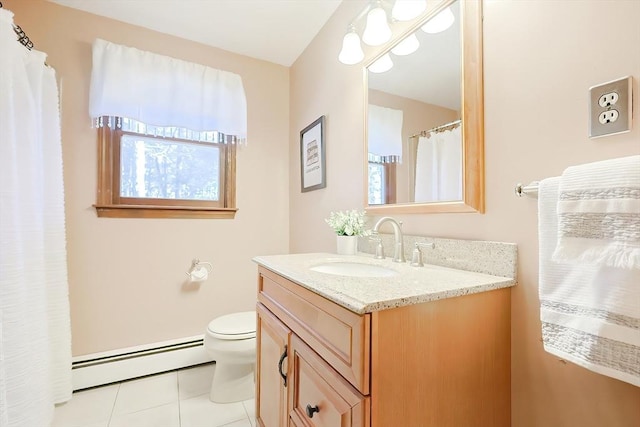 bathroom featuring vanity, toilet, tile patterned flooring, and a baseboard radiator