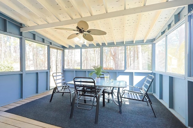 sunroom featuring wooden ceiling, vaulted ceiling with beams, and ceiling fan