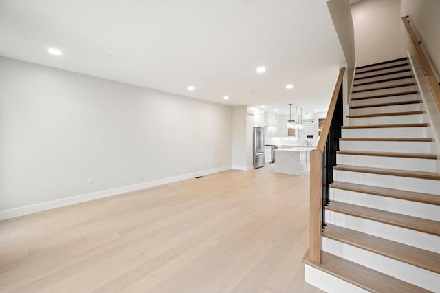 21 Ashland Unit 21, Boston, MA 02122 - stairway featuring recessed lighting, wood finished floors, and baseboards