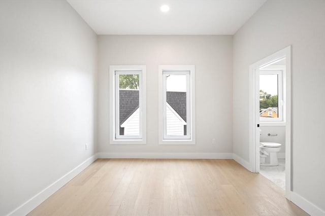 21 Ashland Unit 21, Boston, MA 02122 - spare room with light wood-type flooring and baseboards