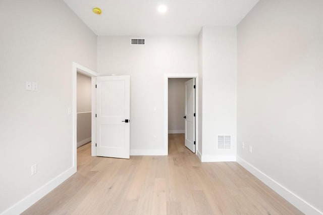 21 Ashland Unit 21, Boston, MA 02122 - unfurnished bedroom with light wood-style flooring, baseboards, and recessed lighting