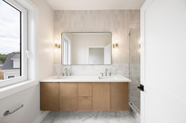 21 Ashland Unit 21, Boston, MA 02122 - bathroom with double vanity, marble finish flooring, a shower, and tile walls