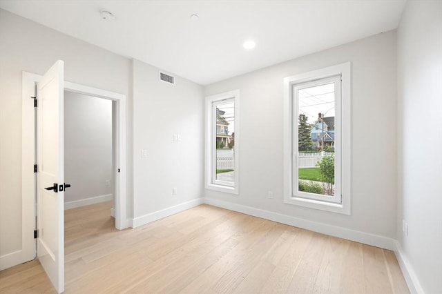 21 Ashland Unit 21, Boston, MA 02122 - empty room with light wood finished floors, baseboards, and recessed lighting
