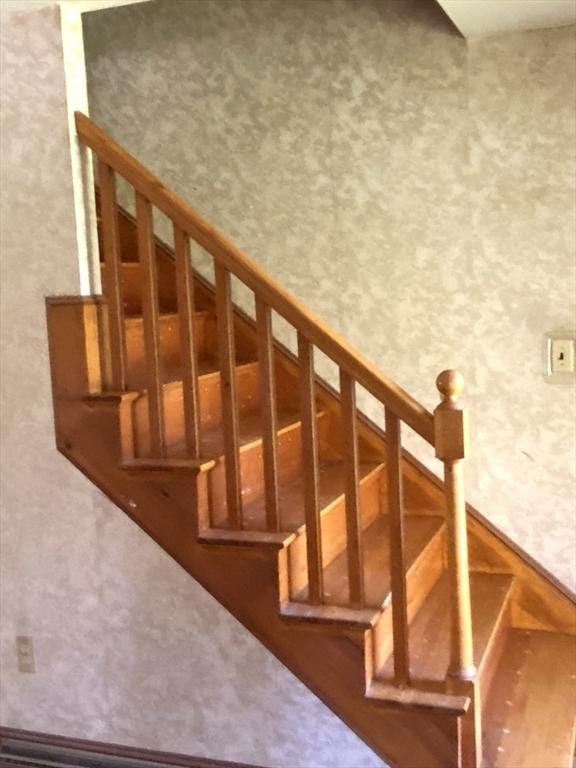 101 Highfields Rd, Abington, MA 02351 - staircase with wood finished floors and baseboards