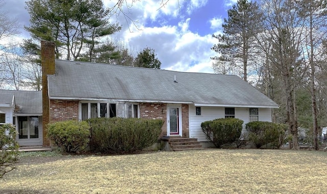 101 Highfields Rd, Abington, MA 02351 - new england style home featuring a chimney and brick siding
