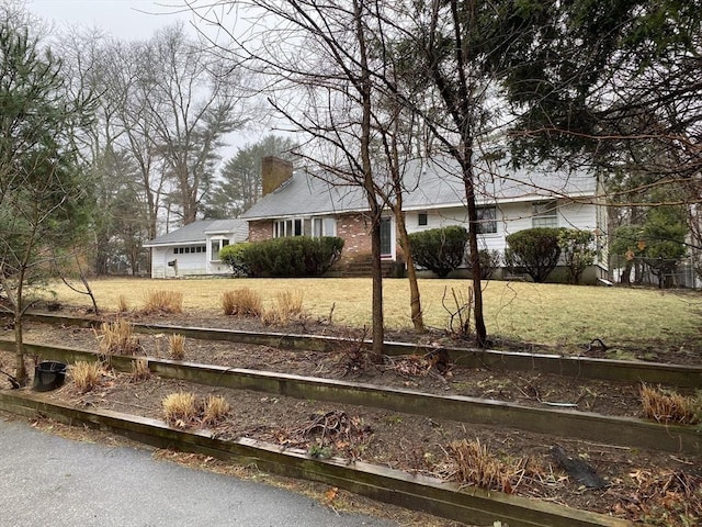 101 Highfields Rd, Abington, MA 02351 - ranch-style home with a chimney and a front lawn