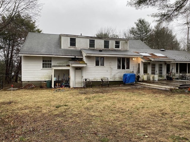 101 Highfields Rd, Abington, MA 02351 - back of property with a lawn, french doors, and a wooden deck