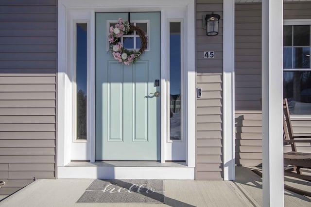 entrance to property with covered porch