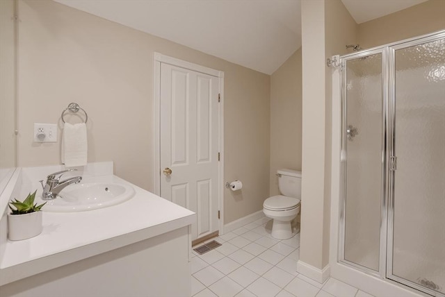 bathroom featuring vaulted ceiling, tile patterned flooring, vanity, an enclosed shower, and toilet