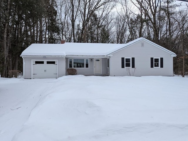 single story home featuring a garage and a chimney