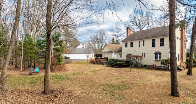 view of yard with a wooden deck