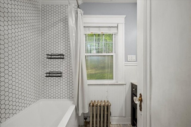 bathroom featuring vanity and radiator