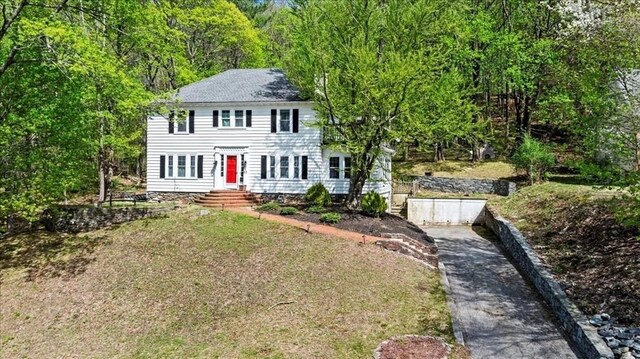 colonial home with driveway