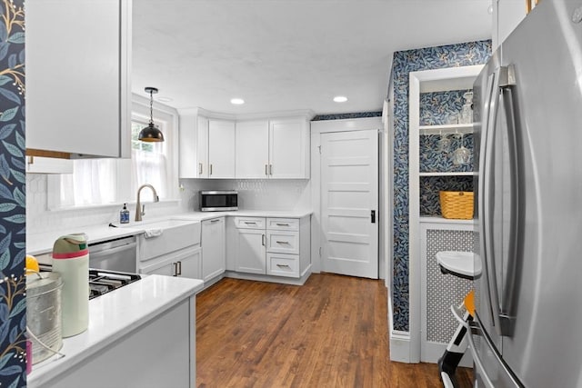 20 Saint Elmo Rd, Worcester, MA 01602 - kitchen with appliances with stainless steel finishes, light countertops, white cabinets, dark wood-type flooring, and recessed lighting
