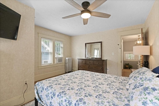 20 Saint Elmo Rd, Worcester, MA 01602 - bedroom featuring radiator, baseboards, ceiling fan, and a textured ceiling