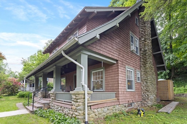 20 Saint Elmo Rd, Worcester, MA 01602 - view of side of home with covered porch and a chimney