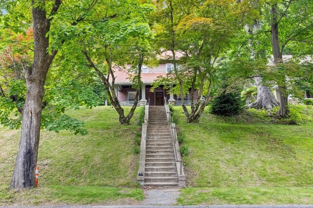 20 Saint Elmo Rd, Worcester, MA 01602 - obstructed view of property featuring stairs and a porch