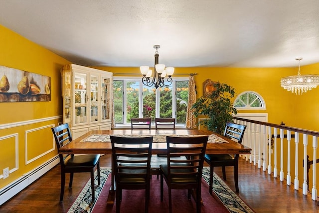 44 Drexel St, Worcester, MA 01602 - dining space with a chandelier, a baseboard heating unit, wood finished floors, and a wainscoted wall