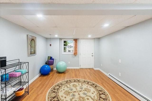 44 Drexel St, Worcester, MA 01602 - exercise area with baseboard heating, wood finished floors, a drop ceiling, baseboards, and recessed lighting