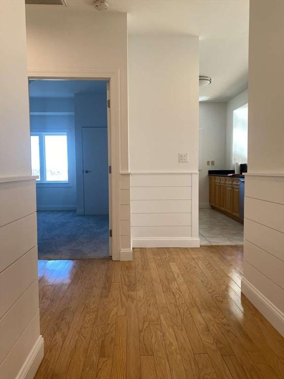 spare room featuring light hardwood / wood-style floors