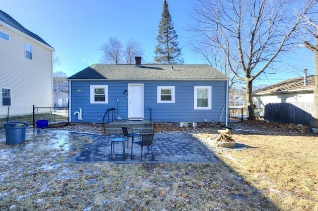 rear view of house with a patio