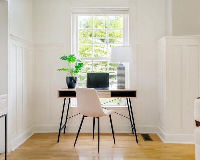 65 Glen Rd Unit H4, Brookline, MA 02445 - office space featuring a decorative wall, light wood-style flooring, and wainscoting