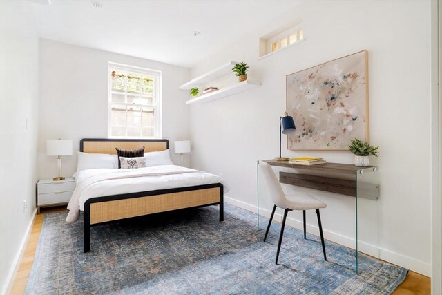 65 Glen Rd Unit H4, Brookline, MA 02445 - bedroom featuring baseboards and wood finished floors