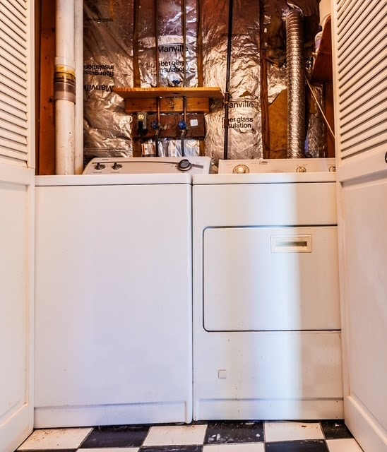 clothes washing area with independent washer and dryer