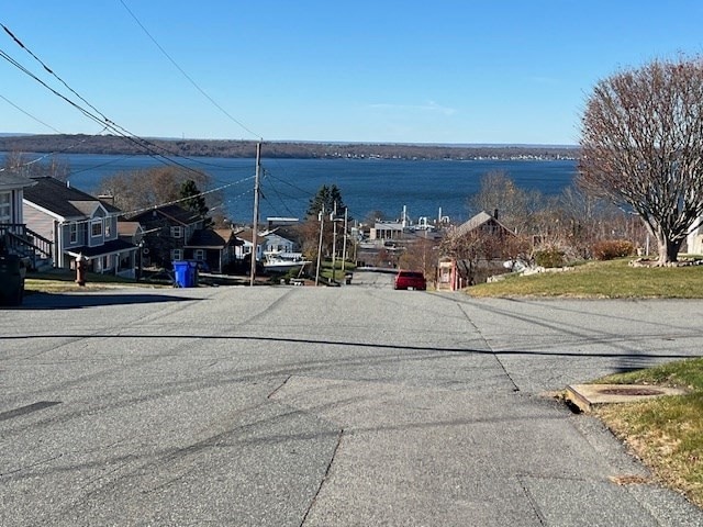 view of street featuring a water view