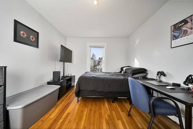 bedroom featuring light hardwood / wood-style floors