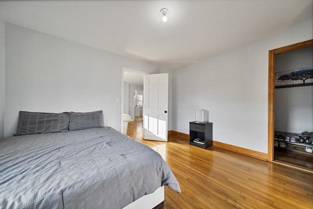 bedroom featuring hardwood / wood-style flooring