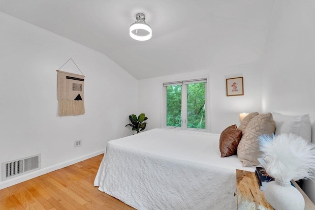 10 Fox Holw Unit 10, Wayland, MA 01778 - bedroom featuring vaulted ceiling and light wood-style floors
