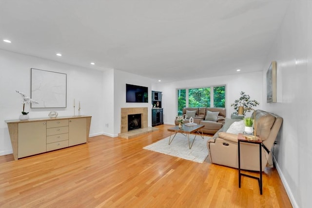 10 Fox Holw Unit 10, Wayland, MA 01778 - living room featuring light wood-style flooring, a tile fireplace, and recessed lighting