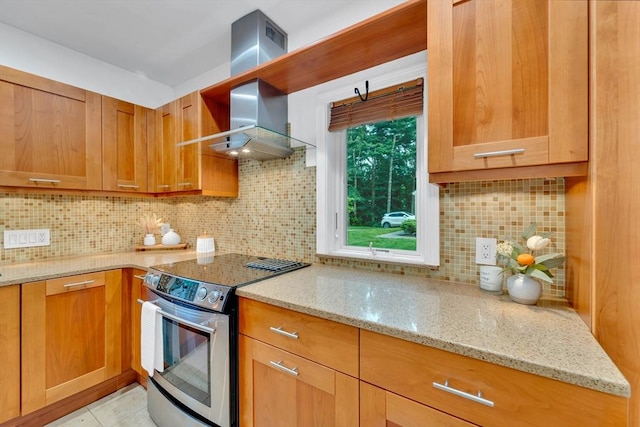 10 Fox Holw Unit 10, Wayland, MA 01778 - kitchen featuring electric range, wall chimney range hood, tasteful backsplash, and light stone countertops