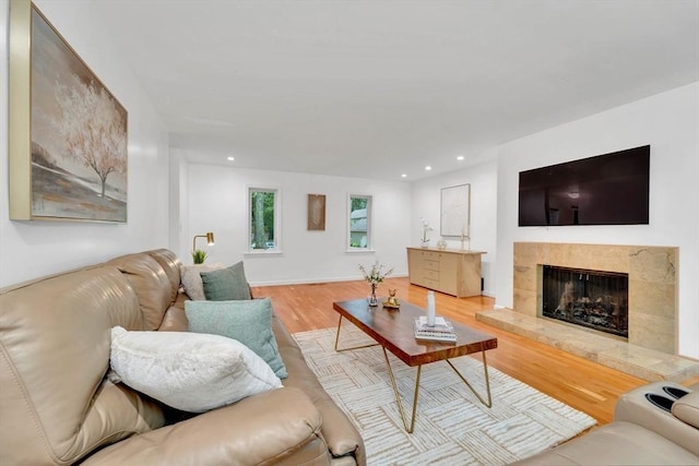10 Fox Holw Unit 10, Wayland, MA 01778 - living area with wood finished floors, a tiled fireplace, and recessed lighting