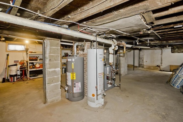 below grade area with a heating unit and water heater