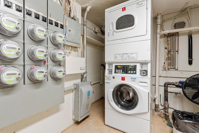 laundry room with stacked washer and clothes dryer