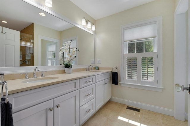 101 Pheasant Hill Cir, Barnstable, MA 02635 - bathroom with double vanity, tile patterned flooring, and recessed lighting