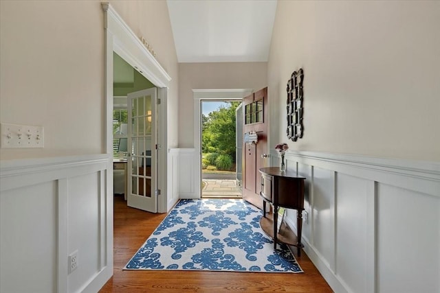 101 Pheasant Hill Cir, Barnstable, MA 02635 - entryway with wood finished floors, vaulted ceiling, and wainscoting