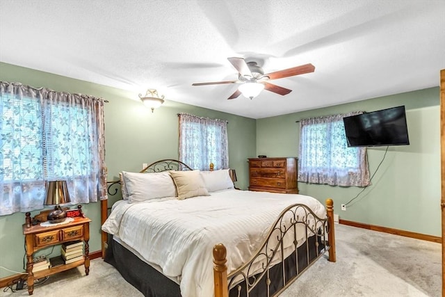98 Town Farm Rd, Monson, MA 01057 - bedroom with light colored carpet, baseboards, and a ceiling fan