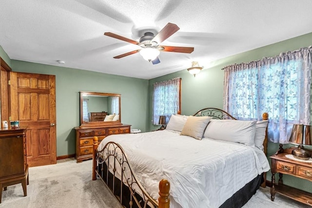 98 Town Farm Rd, Monson, MA 01057 - bedroom featuring light carpet, a ceiling fan, a textured ceiling, and baseboards
