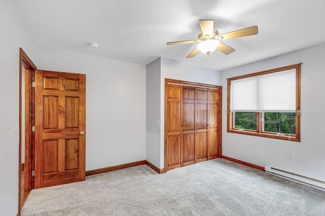 98 Town Farm Rd, Monson, MA 01057 - unfurnished bedroom featuring a baseboard radiator, a closet, carpet floors, and baseboards