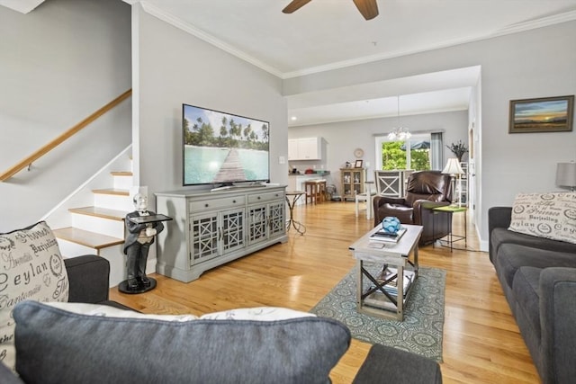 5 Mackenzie Way Unit 5, Haverhill, MA 01832 - living room with crown molding, wood finished floors, a ceiling fan, stairway, and a chandelier