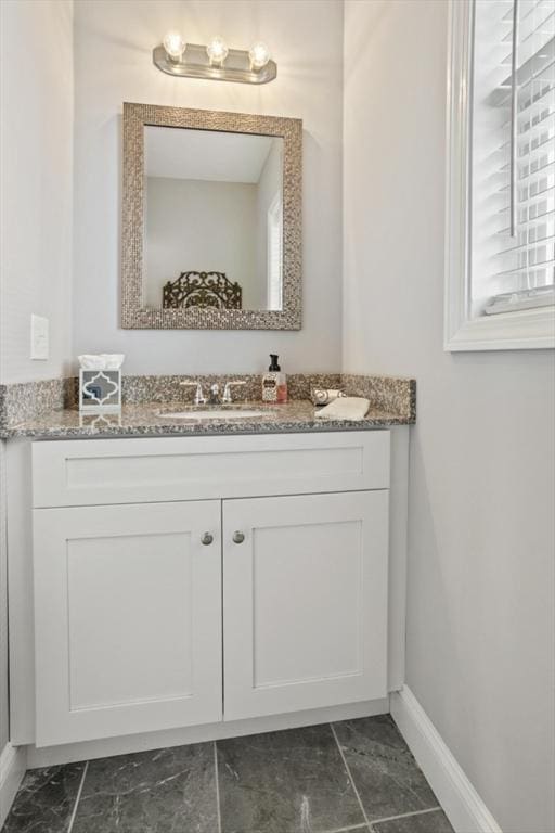 5 Mackenzie Way Unit 5, Haverhill, MA 01832 - bathroom with marble look tile flooring and vanity