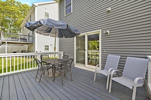5 Mackenzie Way Unit 5, Haverhill, MA 01832 - wooden terrace with outdoor dining space