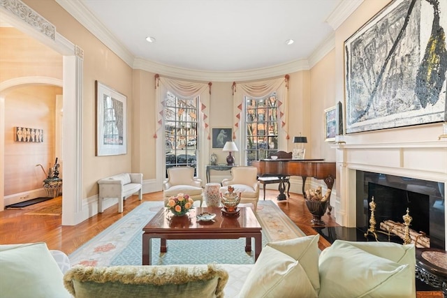 sitting room featuring hardwood / wood-style flooring and crown molding