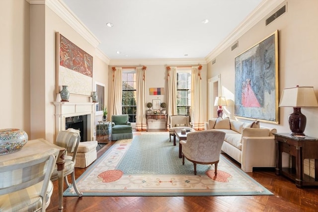 living room featuring dark parquet flooring and ornamental molding